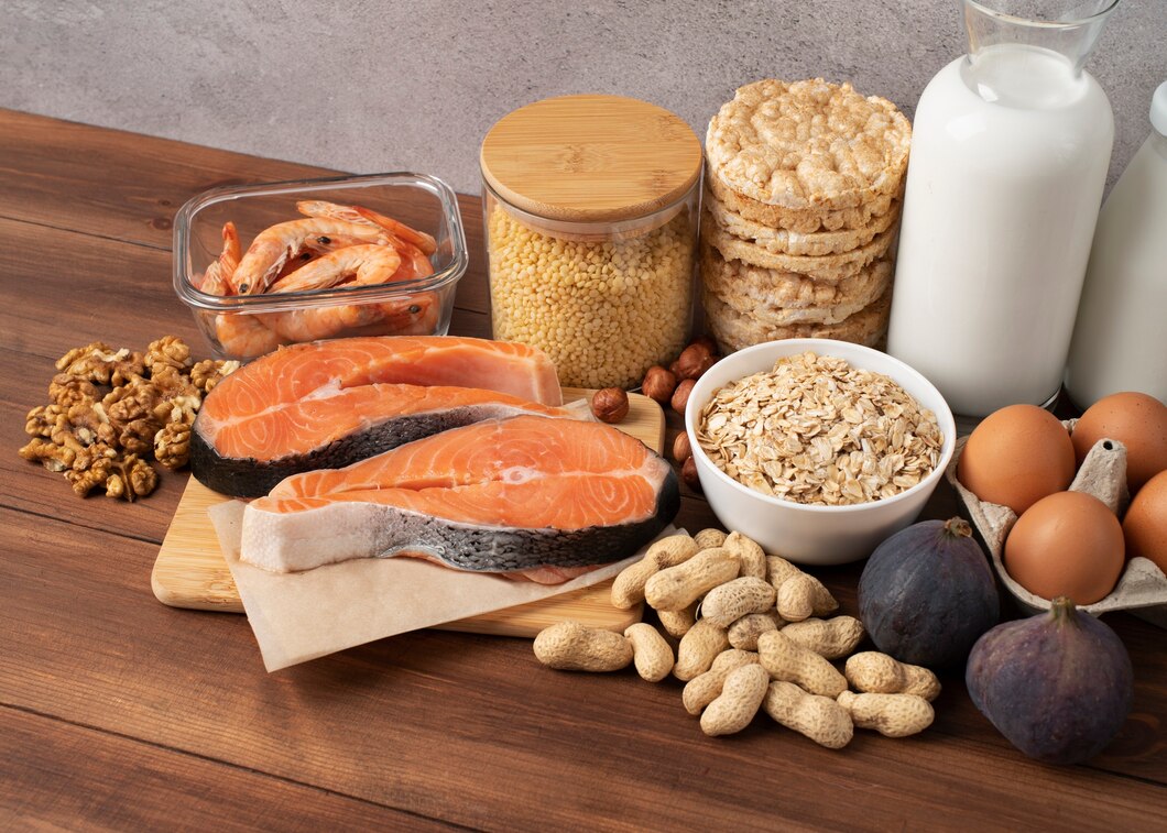 variety of protein-rich foods arranged on a wooden surface